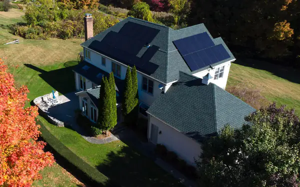 Aerial view of a 12.18 kW rooftop solar panel installation by SunPol Solar on a home in Newtown, CT